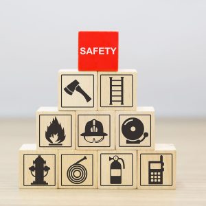 Wooded blocks Stacking with safety icons.